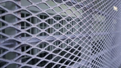 Prison cells through grate close focus Video stock 76224433
