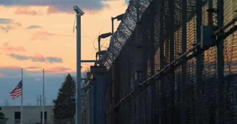 Prison, correctional facility, Time-laps, sunsetting. Stock Footage 143759430