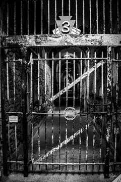 Prison-gate-bw Stock Photos