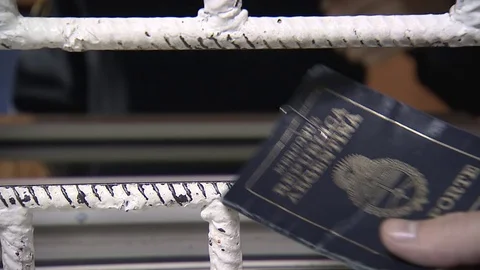 The prison guard checks the documents. Security checkpoint. Video stock 75455009