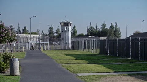 Prison guard tower overlooking the penitentiary yard Stock Footage 331603522