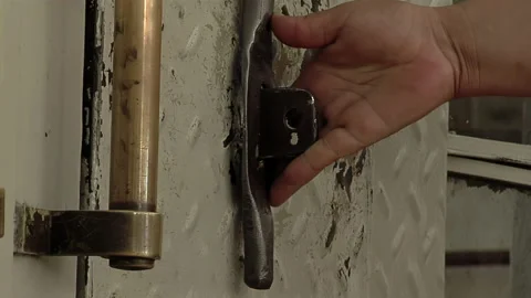 Prison Guards Closing a Rusty Metal Gate at Olmos Penitentiary Argentina Stock Footage 201643752
