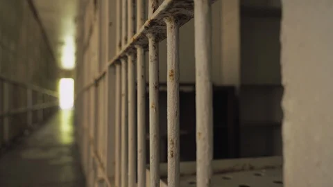 Prison Hall Way with Prisoners Jail Cells Stock Footage