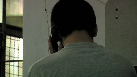 Prison Inmate Making a Monitored Phone Call in Argentine Jail  Stock Footage 201439563