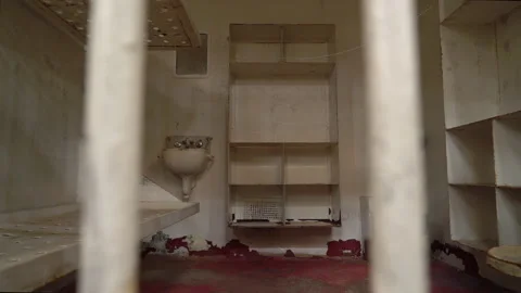 Prison Jail Cell With Camera Panning Through Jail Cell Bars Stock-Footage 133552425