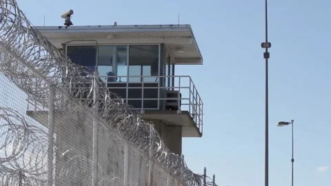 Prison Tower and Prison Fence Stock Footage
