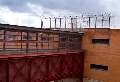 Prison wall and bridge Stock Photos