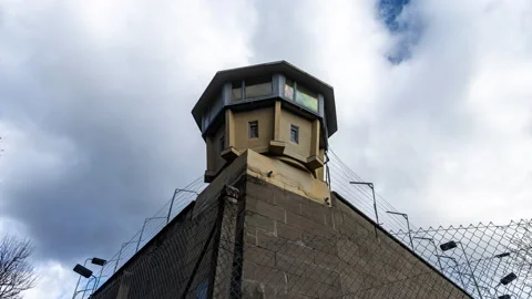 Prison Wall Exterior Guard tower - Stasi Jail Hohenschönhausen Timelapse 8k Stock Footage 233820219