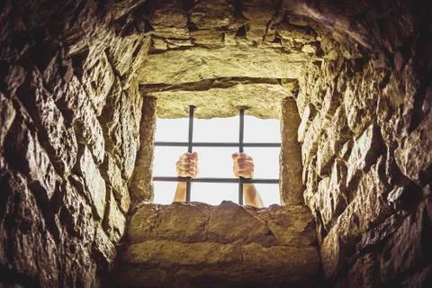 Prison window with metal bars Stock Photos
