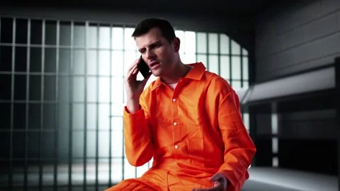 Prisoner Behind Bars In Jail Cell. Crime... Stock Video Pond5