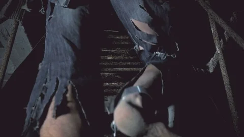 Prisoner in chains coming up the stairs Stock Footage 80241474