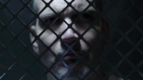 Prisoner in Holding Cell Video stock 83603682
