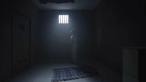 A prisoner looking in the prison room window Vidéo 106823252