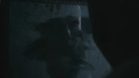 A prisoner looking at the reflection of him in the mirror Stock Footage 259682196