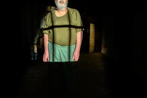 Prisoner in the shadows Stock Photos