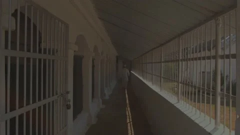 A prisoner walking in the corridor of the prison india Video stock 222034404