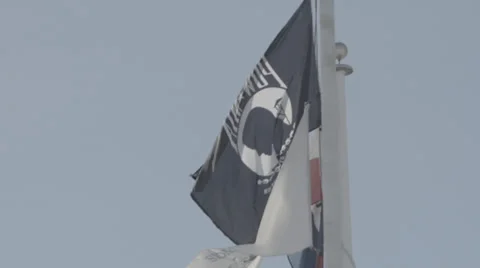 Prisoner of War Flag and Illinois Flag Slow Motion Stock Footage 33894779