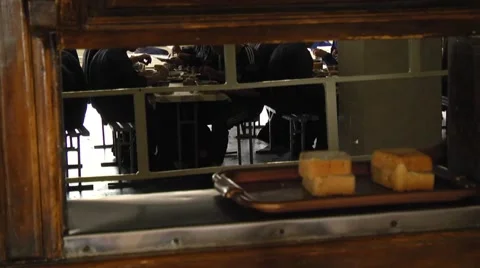 Prisoners distributing bread. The prison canteen Stock-Footage 65565635