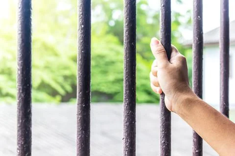 The prisoner's hands Stock Photos