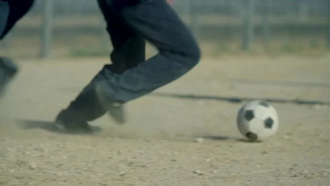 Prisoners playing soccer Stock Footage 211487706