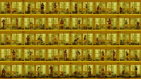 Prisoners serving sentences in a five-storey cell block 4K Stock Footage 77255241