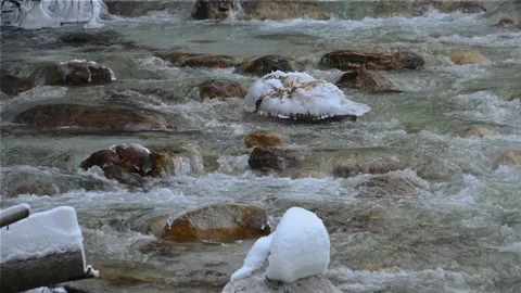 Pristine and clean stream flowing downstream in cold winter season Stock Footage 146886697