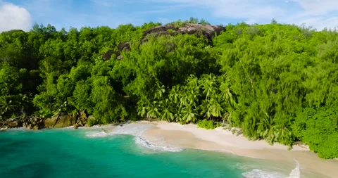 Pristine beach with clear turquoise waters. Seychelles, Mahe. Stock Footage 345382995