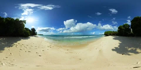 Pristine beach with gentle waves and soft sand. Mahe, Seychelles. Stock Footage 310534022