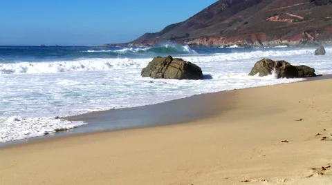 Pristine beach with rocks and waves Stock Footage 43047025
