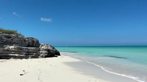 Pristine Beach with Rocky Outcrop Stock Footage 312688838