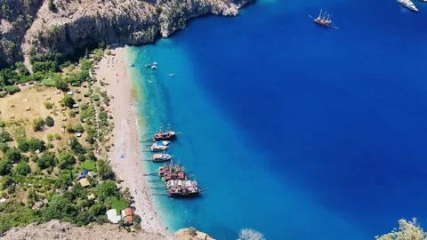 The pristine coastline and crystal clear waters of the Butterfly Valley Stock Footage 288039012