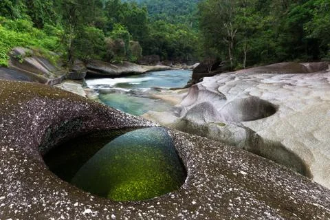 Pristine, emerald, lush Australian rainforest stream and pool Stock Photos