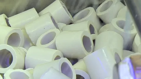 Pristine Filter Elements Cascade in a Vibrant Industrial Ballet Stock Footage 340482019