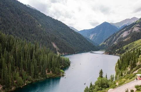 Pristine mountain lake, hidden gem in nature. Perfect for outdoor enthusiasts Stock Photos