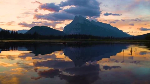 Pristine Mountain Lake At Sunset With Perfect Reflection Video stock 230094474