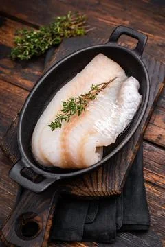 Pristine raw cod fillet, waiting to be marinated and cooked to perfection f.. Stock Photos