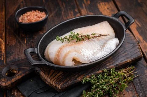 Pristine raw cod fillet, waiting to be marinated and cooked to perfection f.. Stock Photos