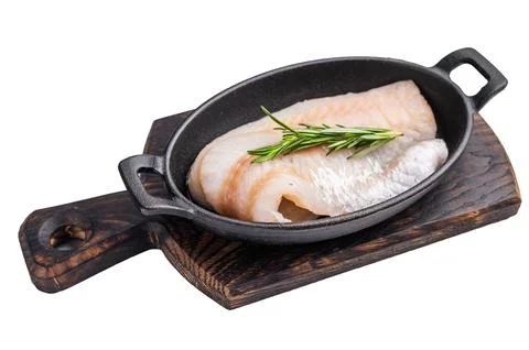 Pristine raw cod fillet, waiting to be marinated and cooked to perfection f.. Stock Photos