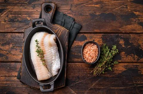 Pristine raw cod fillet, waiting to be marinated and cooked to perfection f.. Stock Photos