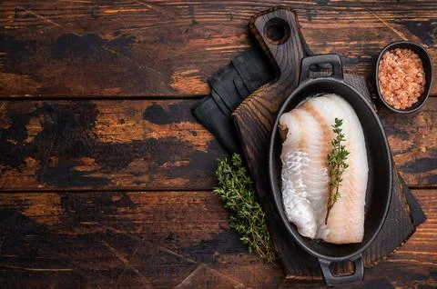 Pristine raw cod fillet, waiting to be marinated and cooked to perfection f.. Stock Photos