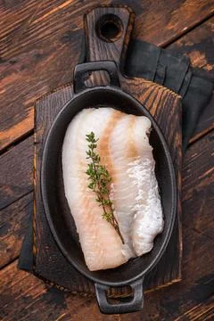 Pristine raw cod fillet, waiting to be marinated and cooked to perfection f.. Stock Photos