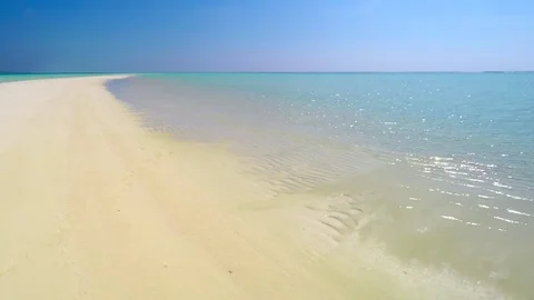 Pristine Sand Bar Surrounded by Crystal Clear Sea in the Maldives Stock-Footage 84196173