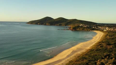 Pristine sandy One Mile beach at sunrise in Forster town of Australia aerial 4k. Stock Footage 200589941