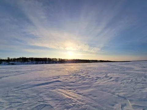 Pristine Snow Dunes and Wind-Swept Ice during Golden Hour Stock Photos