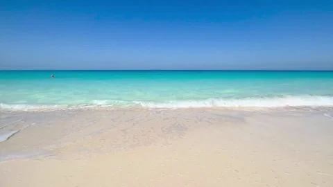Pristine Tropical Beach – Crystal Clear Waves on White Sand Stock Footage 300346062