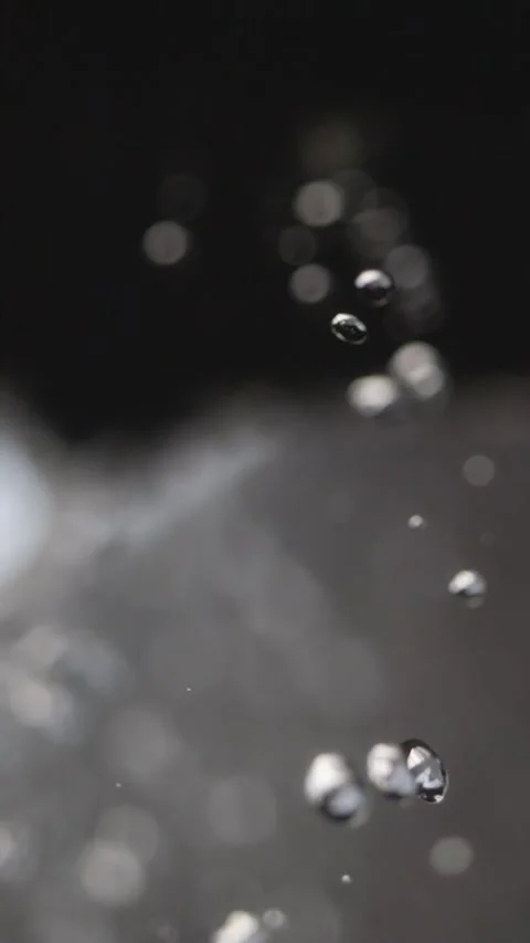 Pristine water drips from rocks in slow motion, each droplet distinct. A wa.. Stock Footage 295346374