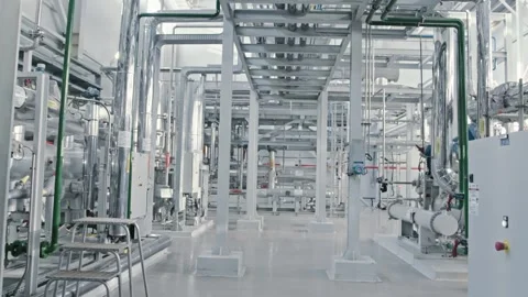Pristine white chemical production facility with shiny chrome piping and sensors Stock Footage 312564695
