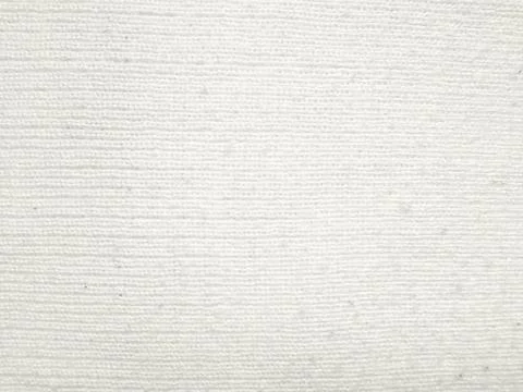 Pristine white knitted fabric texture closeup intricate weave patterns soft d Stock Photos