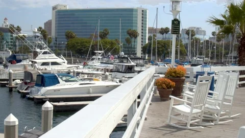 Pristine White Porch Overlooking Seaside Harbor - Ships Docked Video stock 157791895