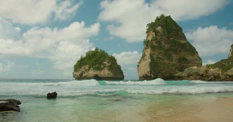 Pristine white sand beach meets turquoise ocean water on Bali Island Nusa Penida Stock Footage 327615400